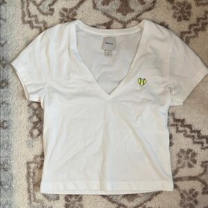 Maeve White V-Neck Tee with Neon Yellow Softball  Heart Accent